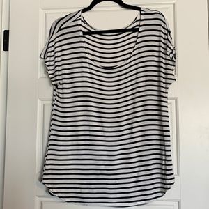 White and navy blue striped shirt. Maurice’s, size Medium